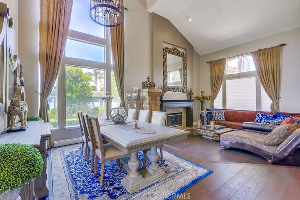 Dining room, Fireplace, Interior, Living room, Pendant Lights, Recessed Lighting, Wood Texture Flooring