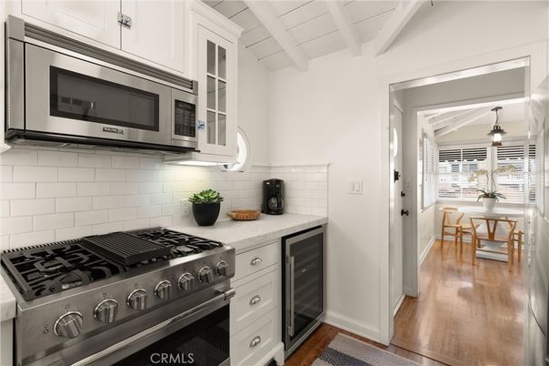 Dining room, Interior, Kitchen, Pendant Lights, Stainless Steel Appliances, Wood Texture Flooring