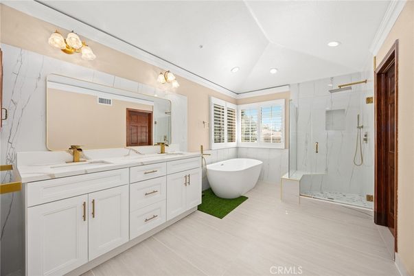 Bathroom, Dual Sink Vanities, Free Standing Baths, Glass Shower, Interior, Marble Walls, Recessed Lighting