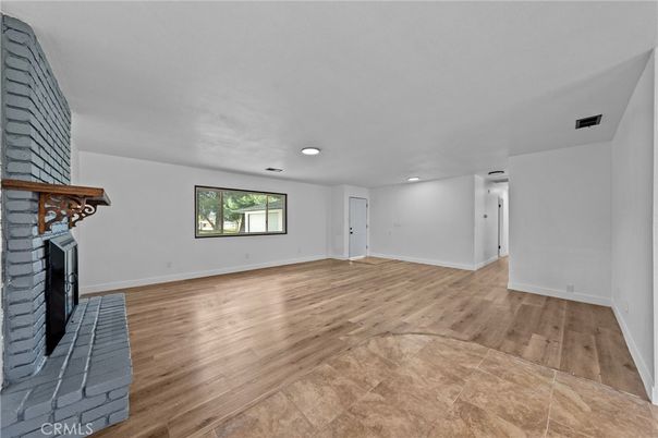 Empty room, Fireplace, Interior, Recessed Lighting, Wood Texture Flooring