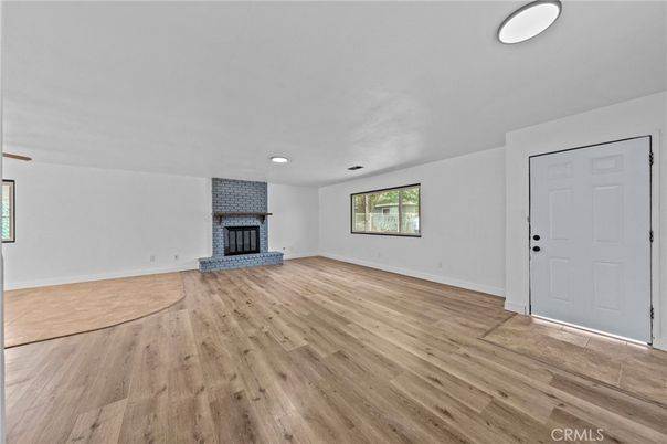 Empty room, Fireplace, Interior, Recessed Lighting, Wood Texture Flooring