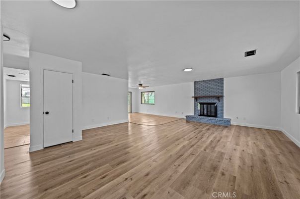 Empty room, Fireplace, Interior, Recessed Lighting, Wood Texture Flooring