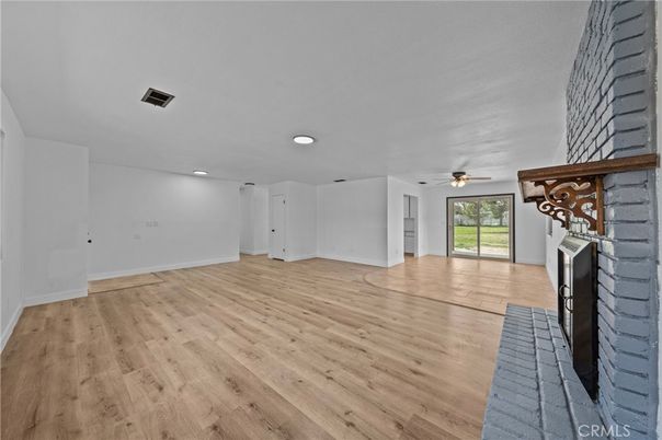 Empty room, Fireplace, Interior, Recessed Lighting, Wood Texture Flooring