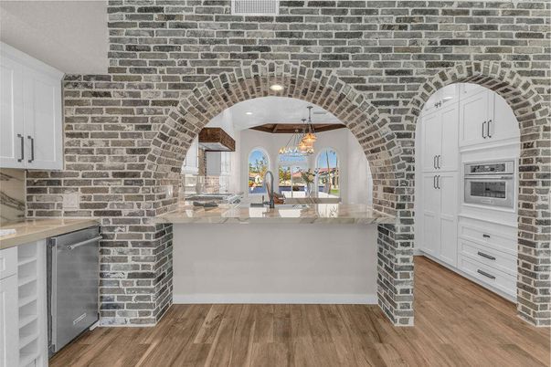 Interior, Kitchen, Pendant Lights, Stainless Steel Appliances, Stone Walls, Wood Texture Flooring