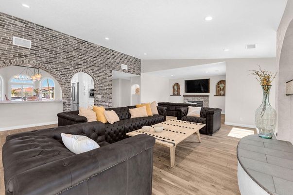 Fireplace, Interior, Living room, Pendant Lights, Recessed Lighting, Stone Walls, Wood Texture Flooring