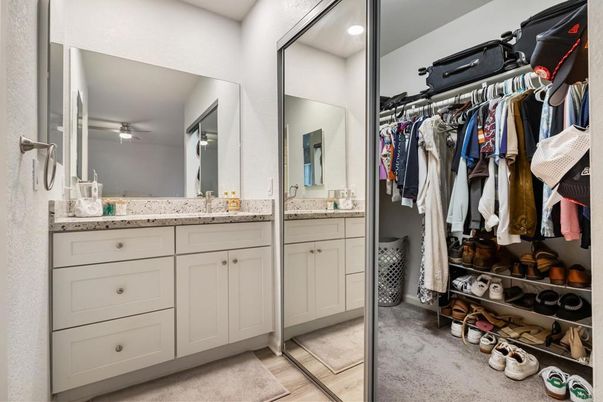 Bathroom, Dual Sink Vanities, Interior, Recessed Lighting, Walk-in Closets