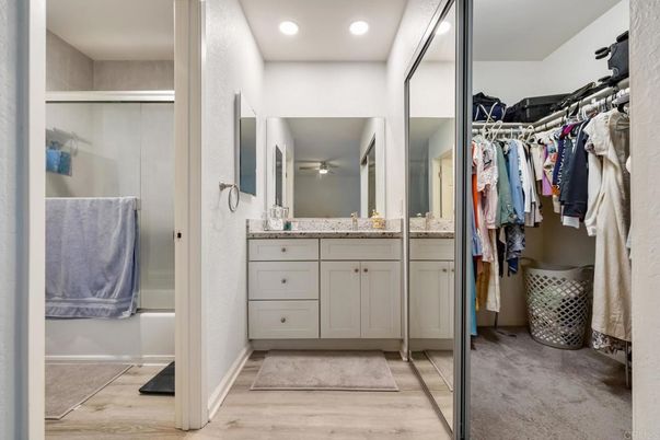 Bathroom, Glass Shower, Interior, Recessed Lighting, Walk-in Closets, Wood Texture Flooring