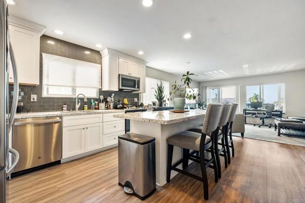 Dining room, Interior, Kitchen, Recessed Lighting, Stainless Steel Appliances, Wood Texture Flooring