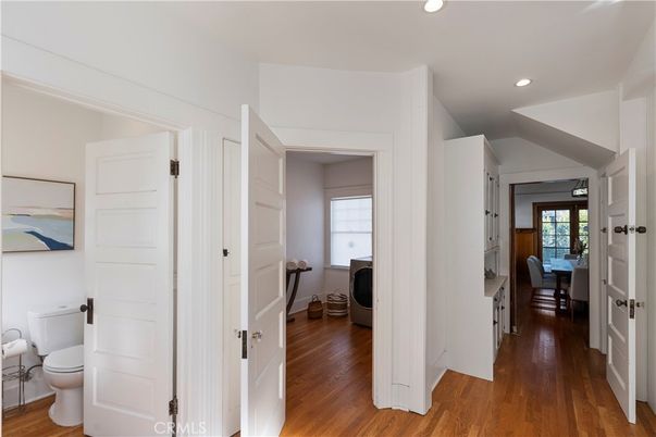 Bathroom, Interior, Recessed Lighting, Washer, Wood Texture Flooring