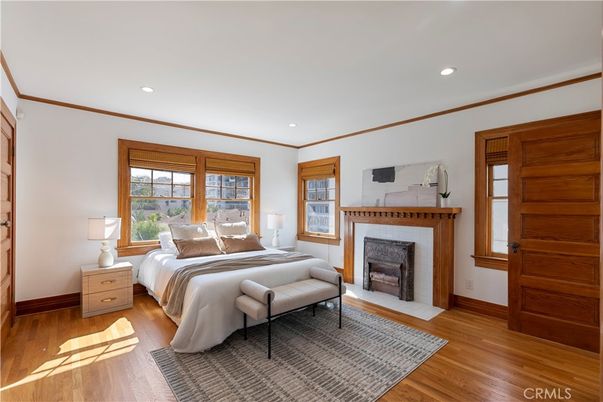 Bedroom, Fireplace, Interior, Recessed Lighting, Wood Texture Flooring
