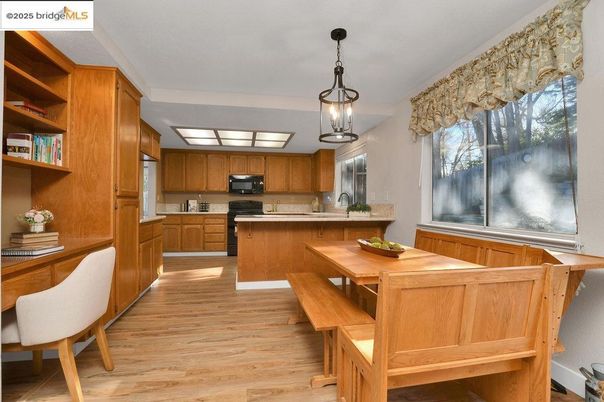 Dining room, Interior, Kitchen, Pendant Lights, Stainless Steel Appliances, Wood Texture Flooring