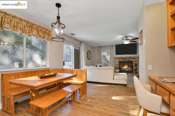 Dining room, Fireplace, Interior, Living room, Pendant Lights, Wood Texture Flooring