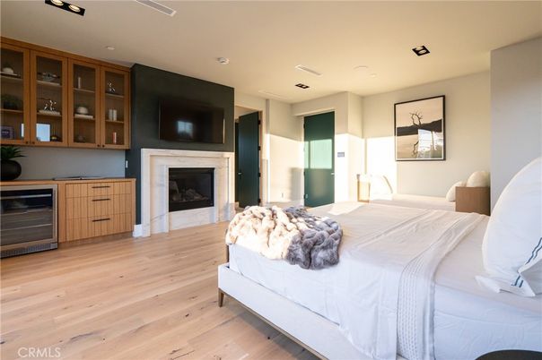 Bedroom, Fireplace, Interior, Recessed Lighting, Wood Texture Flooring