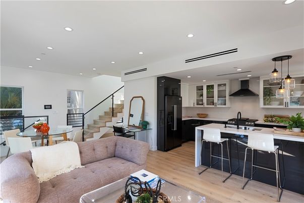 Dining room, Interior, Kitchen, Pendant Lights, Recessed Lighting, Stainless Steel Appliances, Wood Texture Flooring