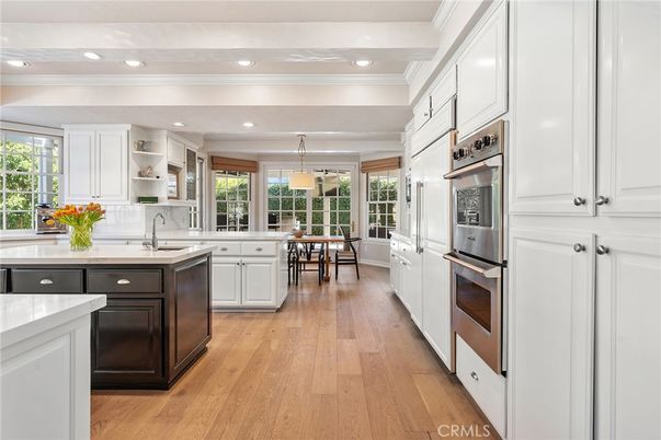 Dining room, Interior, Kitchen, Pendant Lights, Recessed Lighting, Stainless Steel Appliances, Wood Texture Flooring