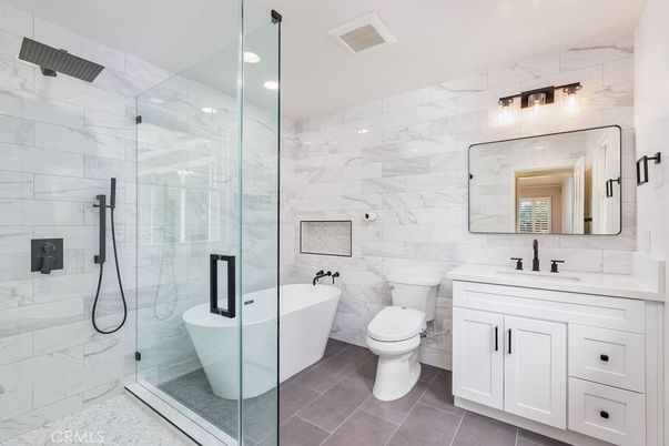 Bathroom, Free Standing Baths, Glass Shower, Interior, Marble Walls, Recessed Lighting