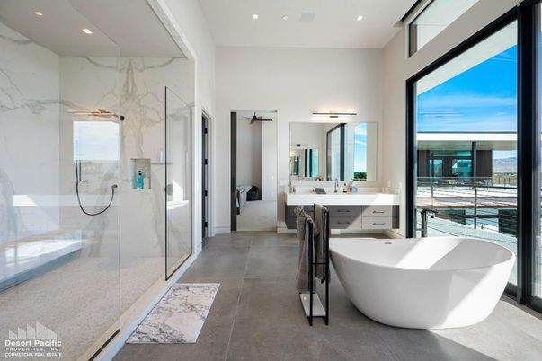 Bathroom, Dual Sink Vanities, Free Standing Baths, Glass Shower, Interior, Marble Walls, Recessed Lighting