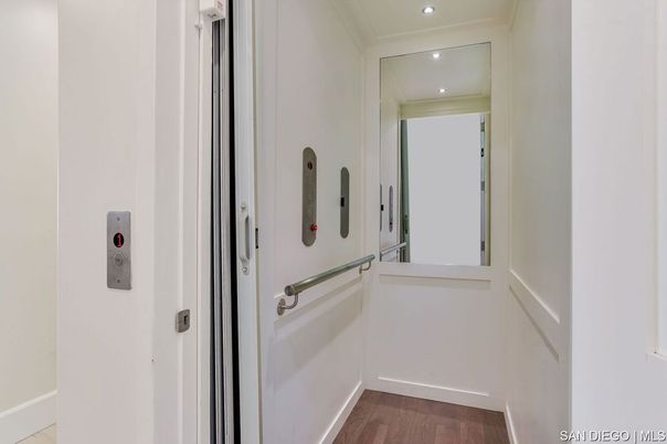 Elevator, Interior, Recessed Lighting, Wood Texture Flooring