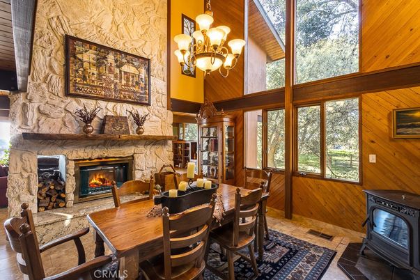 Chandelier, Dining room, Fireplace, Interior, Stone Walls, Wooden Ceilings, Wooden Walls
