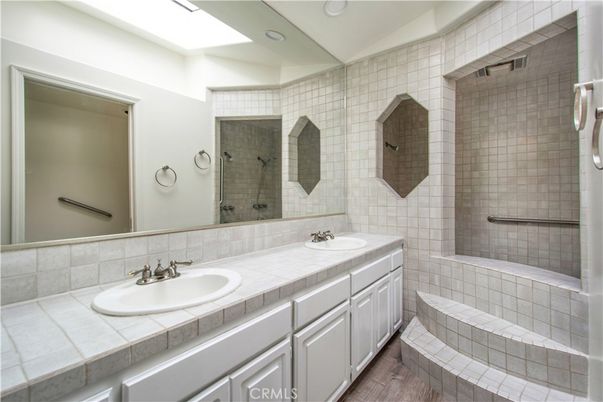 Bathroom, Dual Sink Vanities, Interior, Recessed Lighting, Tile Countertops