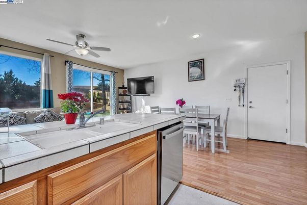 Dining room, Interior, Kitchen, Recessed Lighting, Tile Countertops, Wood Texture Flooring