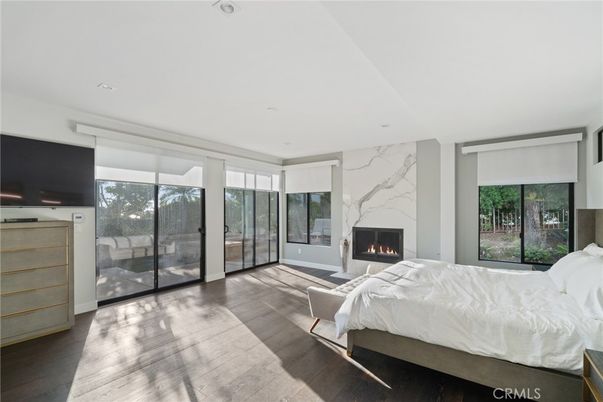 Bedroom, Fireplace, Interior, Marble Walls, Recessed Lighting, Wood Texture Flooring