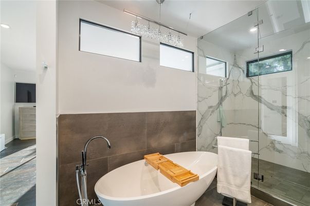 Bathroom, Free Standing Baths, Glass Shower, Interior, Marble Walls, Recessed Lighting