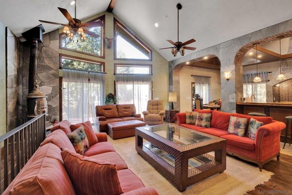 Fireplace, Interior, Living room, Pendant Lights, Recessed Lighting, Stone Walls, Wood Texture Flooring