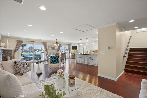 Dining room, Interior, Kitchen, Living room, Pendant Lights, Recessed Lighting, Stainless Steel Appliances, Wood Texture Flooring