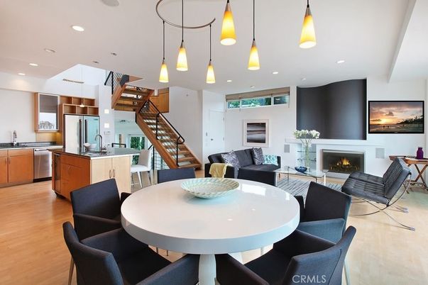 Dining room, Fireplace, Interior, Kitchen, Living room, Pendant Lights, Recessed Lighting, Stainless Steel Appliances, Wood Texture Flooring