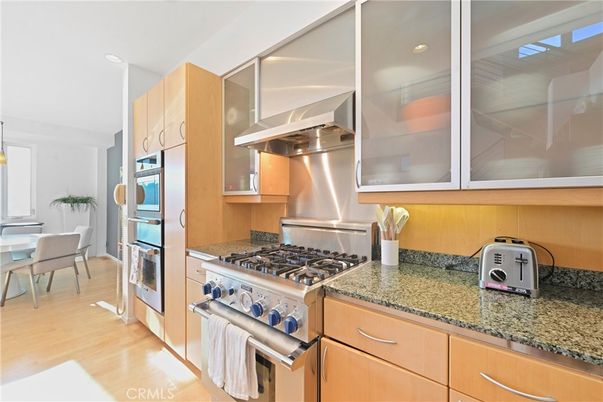 Dining room, Interior, Kitchen, Recessed Lighting, Stainless Steel Appliances, Wood Texture Flooring