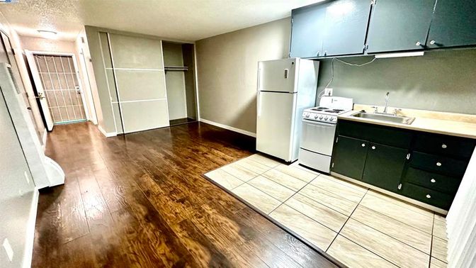 Interior, Kitchen, Tile Countertops, Wood Texture Flooring