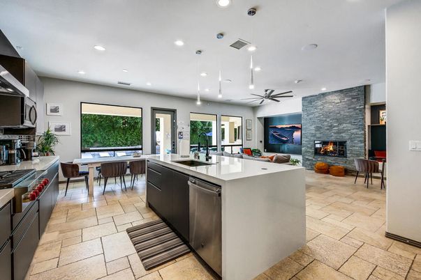 Dining room, Fireplace, Interior, Kitchen, Living room, Pendant Lights, Recessed Lighting, Stainless Steel Appliances, Stone Walls