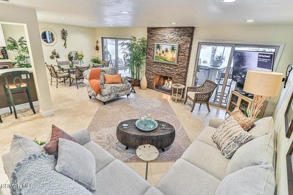 Dining room, Fireplace, Interior, Living room, Recessed Lighting, Stone Walls