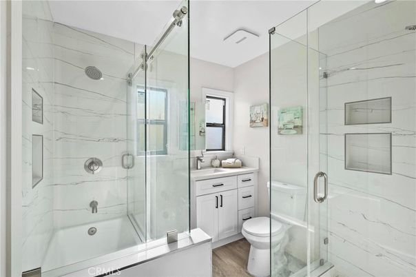 Bathroom, Glass Shower, Interior, Marble Walls, Wood Texture Flooring