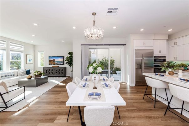 Chandelier, Dining room, Interior, Kitchen, Living room, Recessed Lighting, Stainless Steel Appliances, Wood Texture Flooring