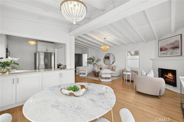 Chandelier, Dining room, Fireplace, Interior, Kitchen, Living room, Stainless Steel Appliances, Wood Texture Flooring