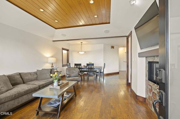 Dining room, Fireplace, Interior, Living room, Pendant Lights, Recessed Lighting, Wooden Ceilings, Wood Texture Flooring