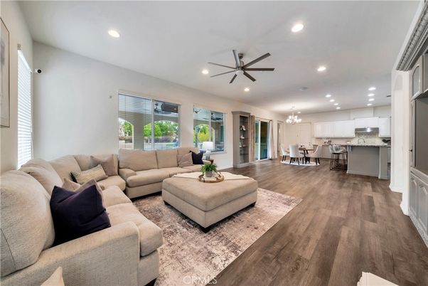 Chandelier, Dining room, Interior, Kitchen, Living room, Recessed Lighting, Stainless Steel Appliances, Wood Texture Flooring