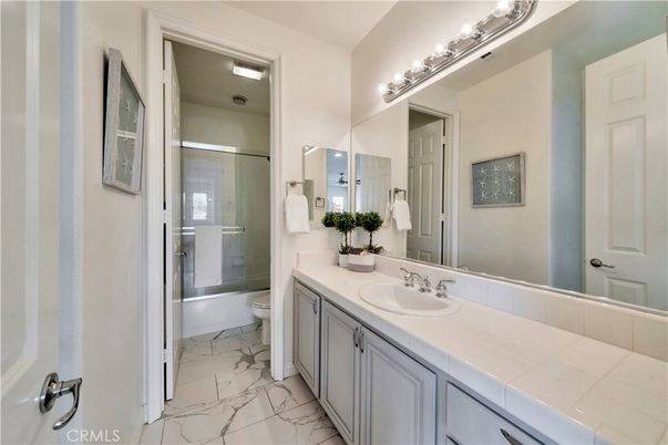 Bathroom, Dual Sink Vanities, Glass Shower, Interior, Marble, Tile Countertops