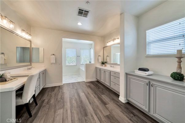 Bathroom, Dual Sink Vanities, Interior, Marble, Recessed Lighting, Wood Texture Flooring