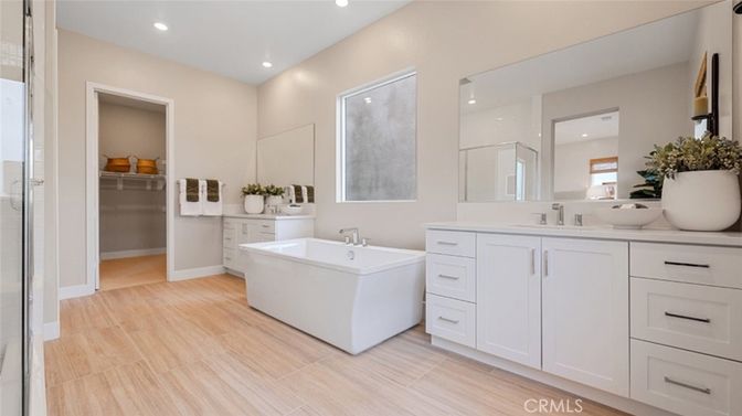 Bathroom, Dual Sink Vanities, Free Standing Baths, Interior, Recessed Lighting, Wood Texture Flooring