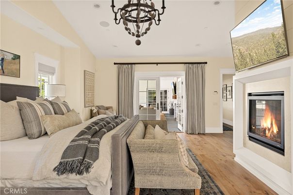 Bedroom, Chandelier, Fireplace, Interior, Living room, Pendant Lights, Wood Texture Flooring