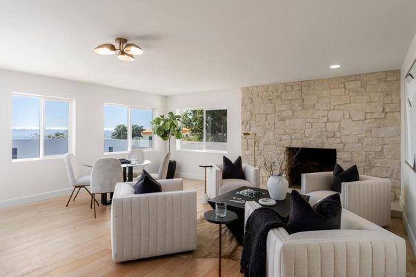Dining room, Fireplace, Interior, Living room, Recessed Lighting, Stone Walls, Wood Texture Flooring