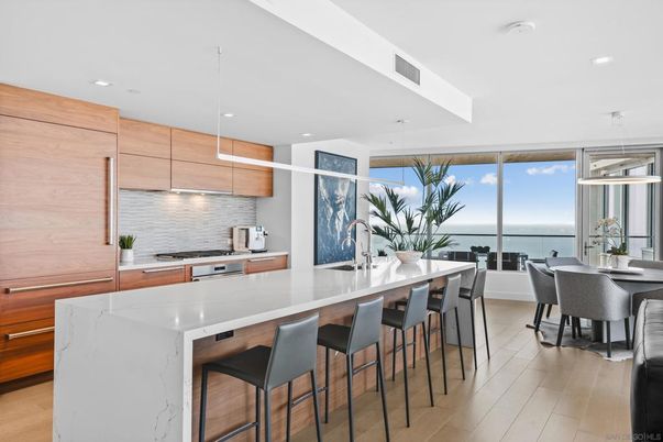 Dining room, Interior, Kitchen, Pendant Lights, Recessed Lighting, Stainless Steel Appliances, Water, Wood Texture Flooring