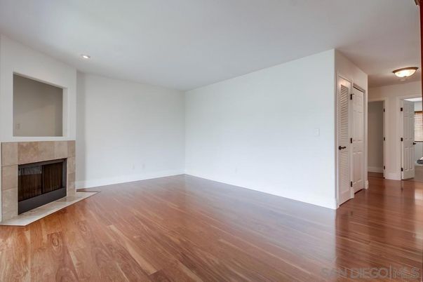 Empty room, Fireplace, Interior, Recessed Lighting, Wood Texture Flooring