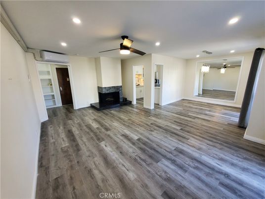 Empty room, Fireplace, Interior, Recessed Lighting, Wood Texture Flooring
