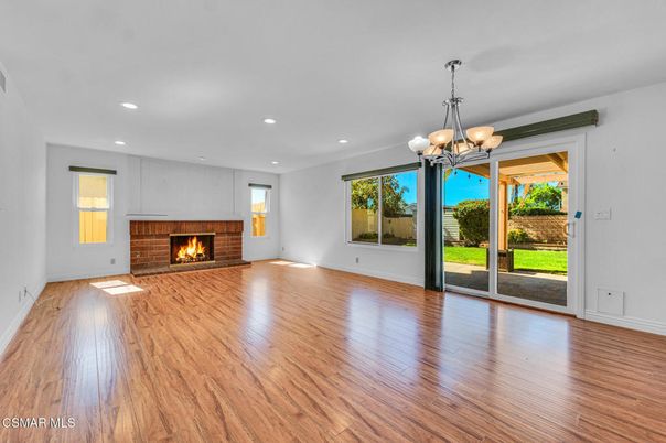 Chandelier, Empty room, Fireplace, Interior, Recessed Lighting, Wood Texture Flooring