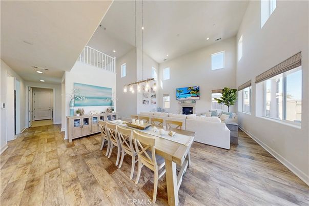 Dining room, Fireplace, Interior, Living room, Pendant Lights, Recessed Lighting, Wood Texture Flooring
