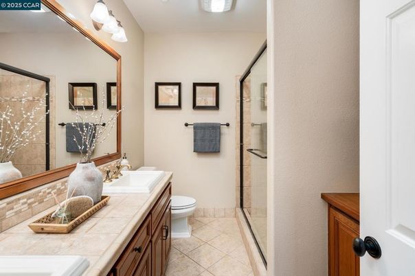 Bathroom, Dual Sink Vanities, Glass Shower, Interior, Tile Countertops